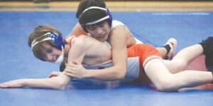Wrestlers struggle in Quads